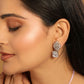 Nuyug Rhodium-Plated Rhinestone Studded Floral Minimal Cotemporary Studs | Swadesiicart
