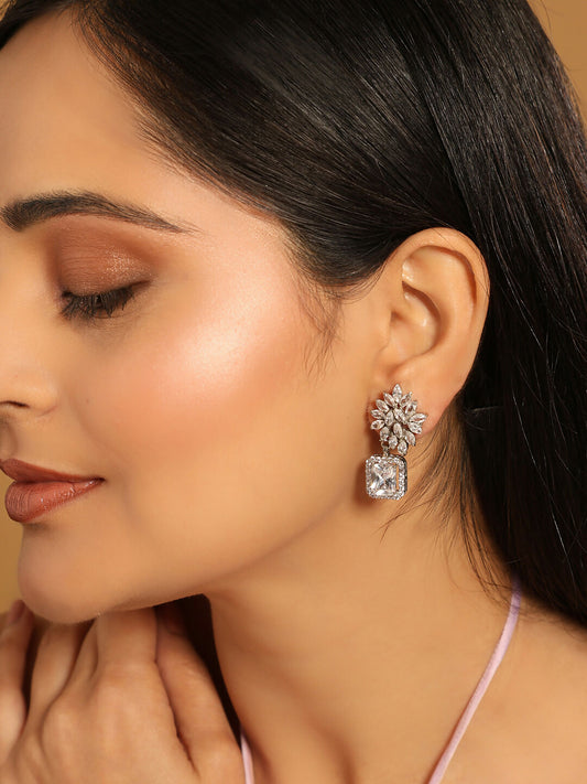 Nuyug Rhodium-Plated Rhinestone Studded Floral Minimal Cotemporary Studs | Swadesiicart