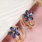 Shining Diva Rose Gold-Polished Blue Floral Studs Earrings