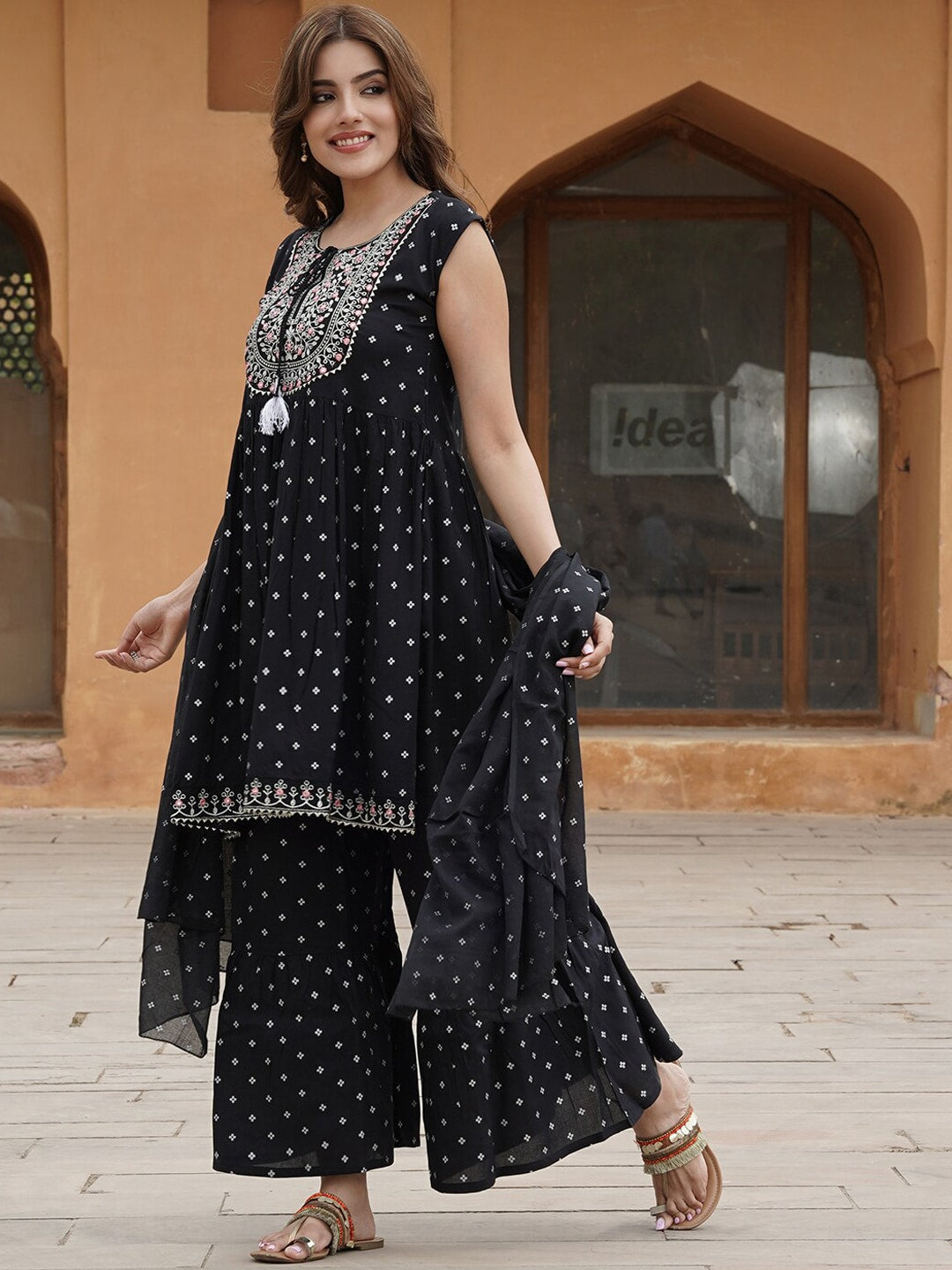 Kalini Ethnic Motifs Printed Tie-Up Neck Thread Work A-Line Kurta with Sharara & Dupatta | Swadesiicart