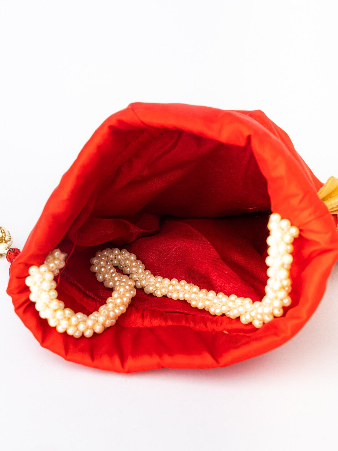 NR By Nidhi Rathi Red & White SHRINATHJI Embroidered Potli Clutch - Swadesiicart