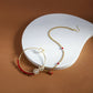 Gold-Polished White Red Kundan-Studded Pearl Beaded Nosepin - Ruby Raang | Swadesiicart