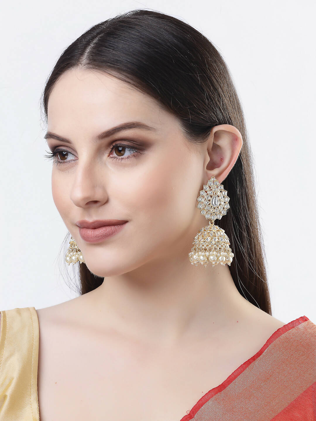 NVR Women Gold-Polished Handcrafted Kundan Jhumka Earrings | Swadesiicart