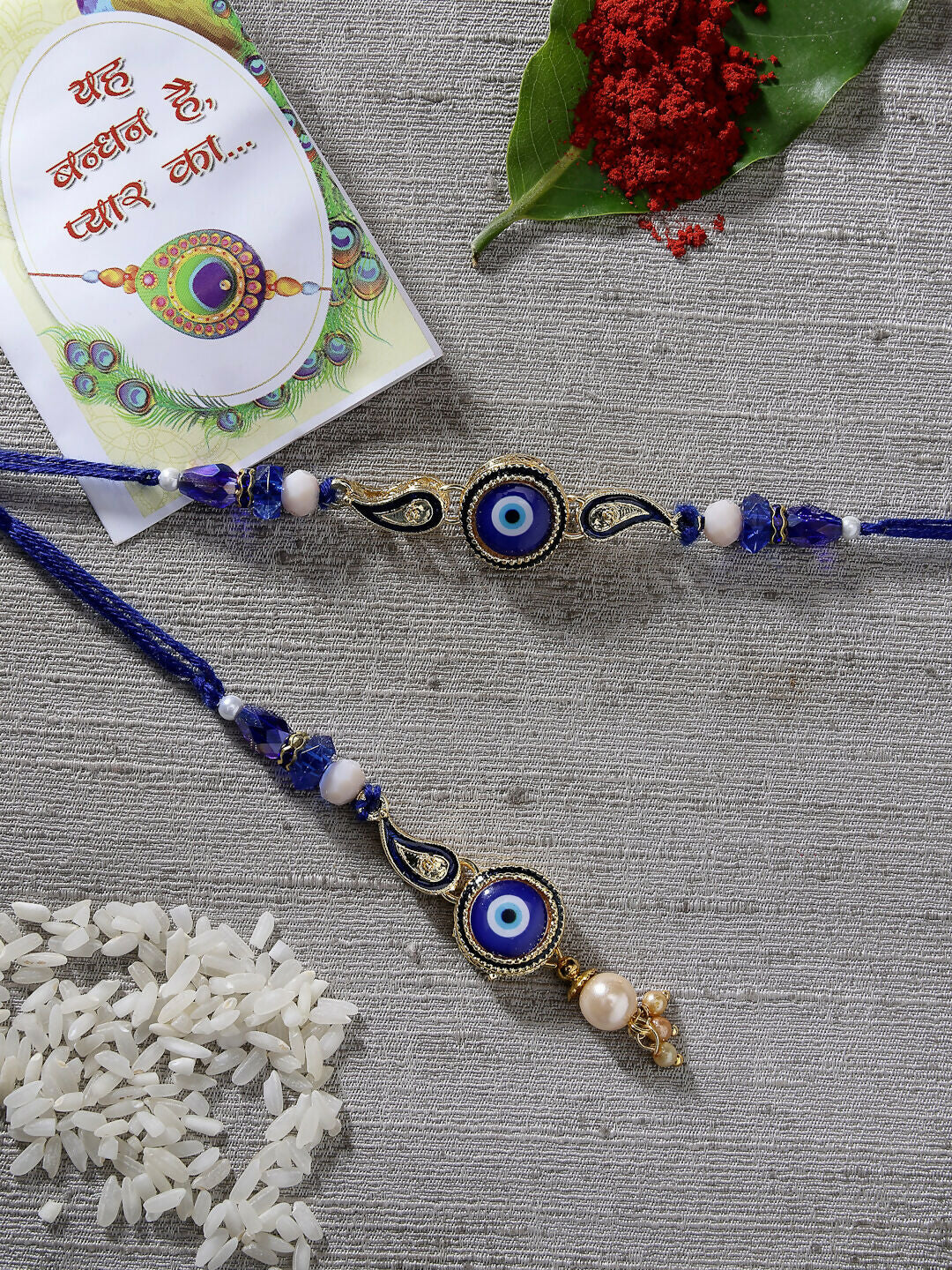 NVR Women & Men Set of 2 Blue Evil Eye Beaded Bhaiya Bhabhi Rakhi With Roli Chawal | Swadesiicart