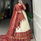 Lorenvalley Offwhite and Red Tussar Silk Patola Print Lehenga Choli | Swadesiicart