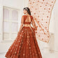 Aastha Fashion Brown Butterfly Net Tone To Tone Thread Work And Mirror Work Embroidery Wedding Wear Lehenga Choli