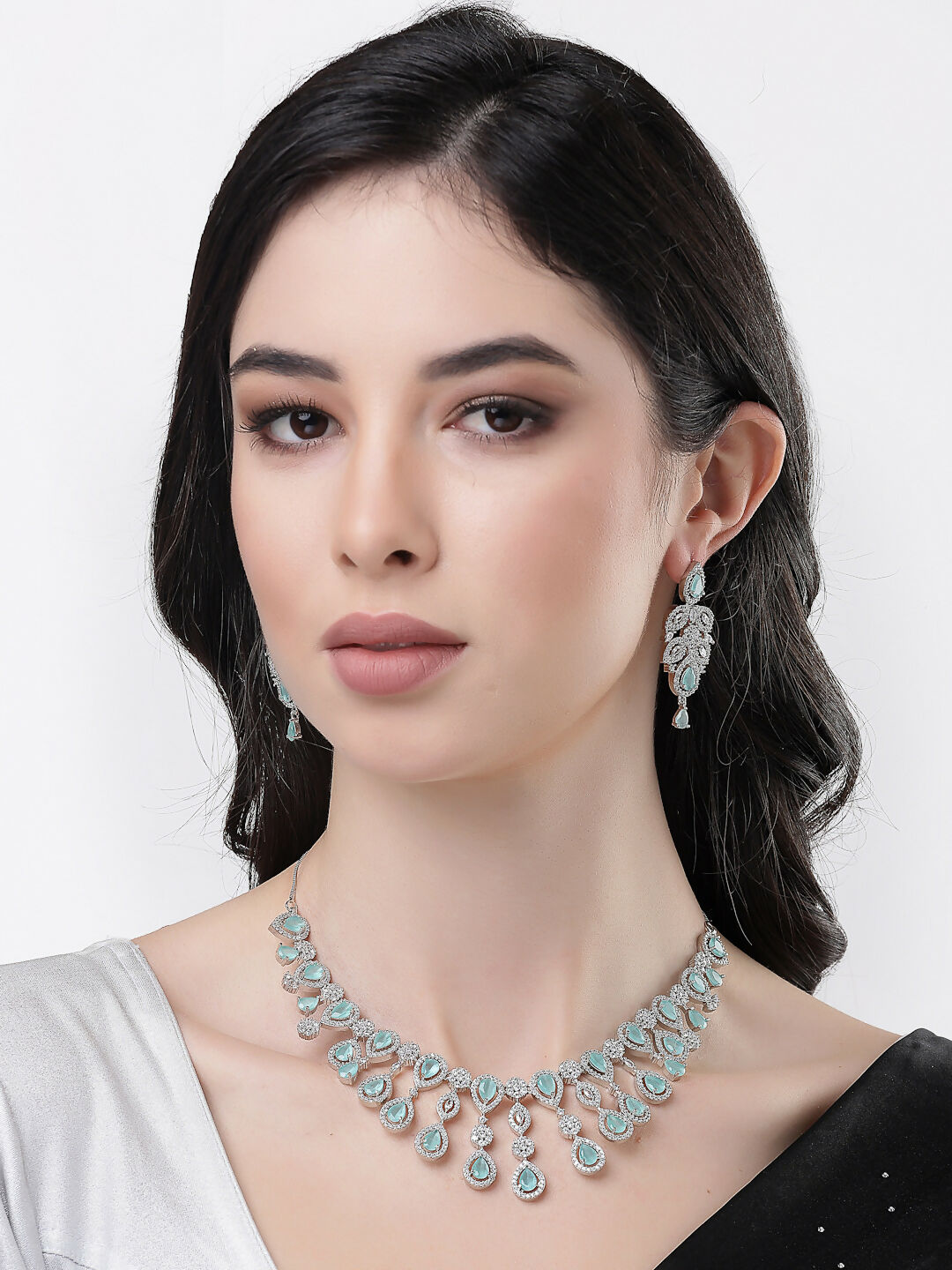 NVR Women's silver plated Turquoise CZ stone handcrafted jewellery set - Swadesiicart