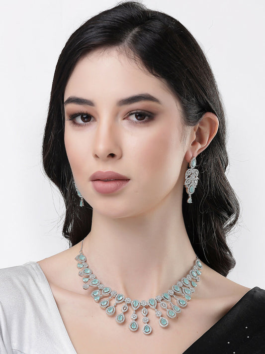 NVR Women's silver plated Turquoise CZ stone handcrafted jewellery set - Swadesiicart