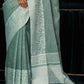 Shree Shyam Fashion Elegant Sea Green Woven Linen Saree with Contrast Zari Border & Tassels - Soft & Breathable Party Wear