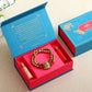 Om Pearl Bracelet Rakhi & Kaju Katli Box | Swadesiicart