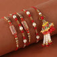 Capsule & Pearl Rakhis With Lumba