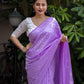 Lavender Poly Georgette Woven Design Saree with Unstitched Blouse - Hiral Fashion | Swadesiicart