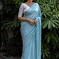 Sky Blue Poly Georgette Woven Design Saree with Unstitched Blouse - Hiral Fashion | Swadesiicart