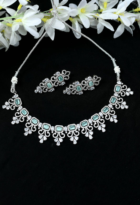 Mominos Fashion Johar Kamal Silver-Plated American Diamond Pista Green Choker Set | Swadesiicart