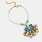 NVR Women & Men Set of 2 Blue Lotus Shape Kundan-Studded & Beaded Handcrafted Wraparound Rakhi Set With Roli Chawal | Swadesiicart