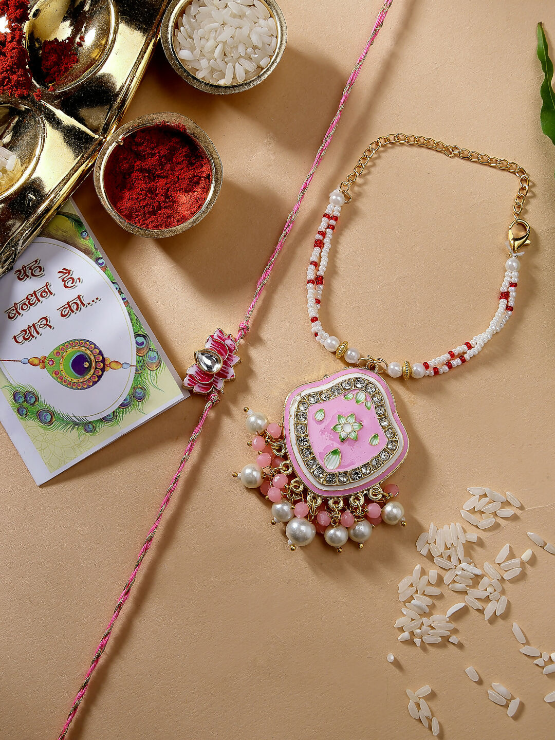NVR Women & Men Set of 2 Pink Lotus Shape Kundan Stone-Studded & Beaded Bhaiya Bhabhi Rakhi With Roli Chawal | Swadesiicart