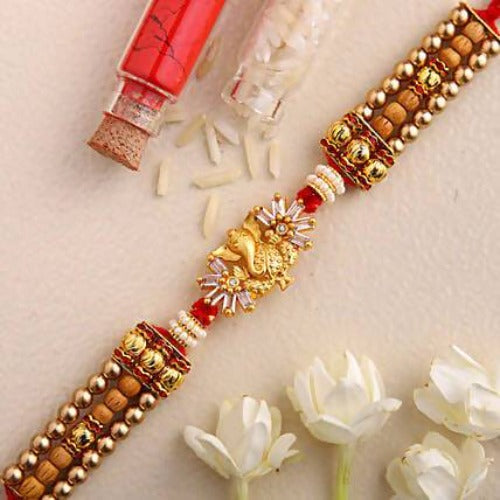 Ganesha Design Rakhi and Kaju Katli Box | Swadesiicart