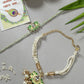 NVR Women & Men Set of 2 Green Lotus Shape Kundan-Studded & Beaded Wraparound Rakhi Set With Roli Chawal & Chocolate | Swadesiicart