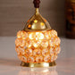 eCraftIndia Gold-Toned & Transparent Crystal & Brass Akhand Diya | Swadesiicart