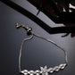 NVR Women Silver-Plated American Diamond Studded Rakhi With Roli Chawal | Swadesiicart