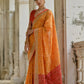 Vishnu Weaves Women's Mustard Raw Silk Thread Ikkat Woven Saree with Blouse - Swadesiicart