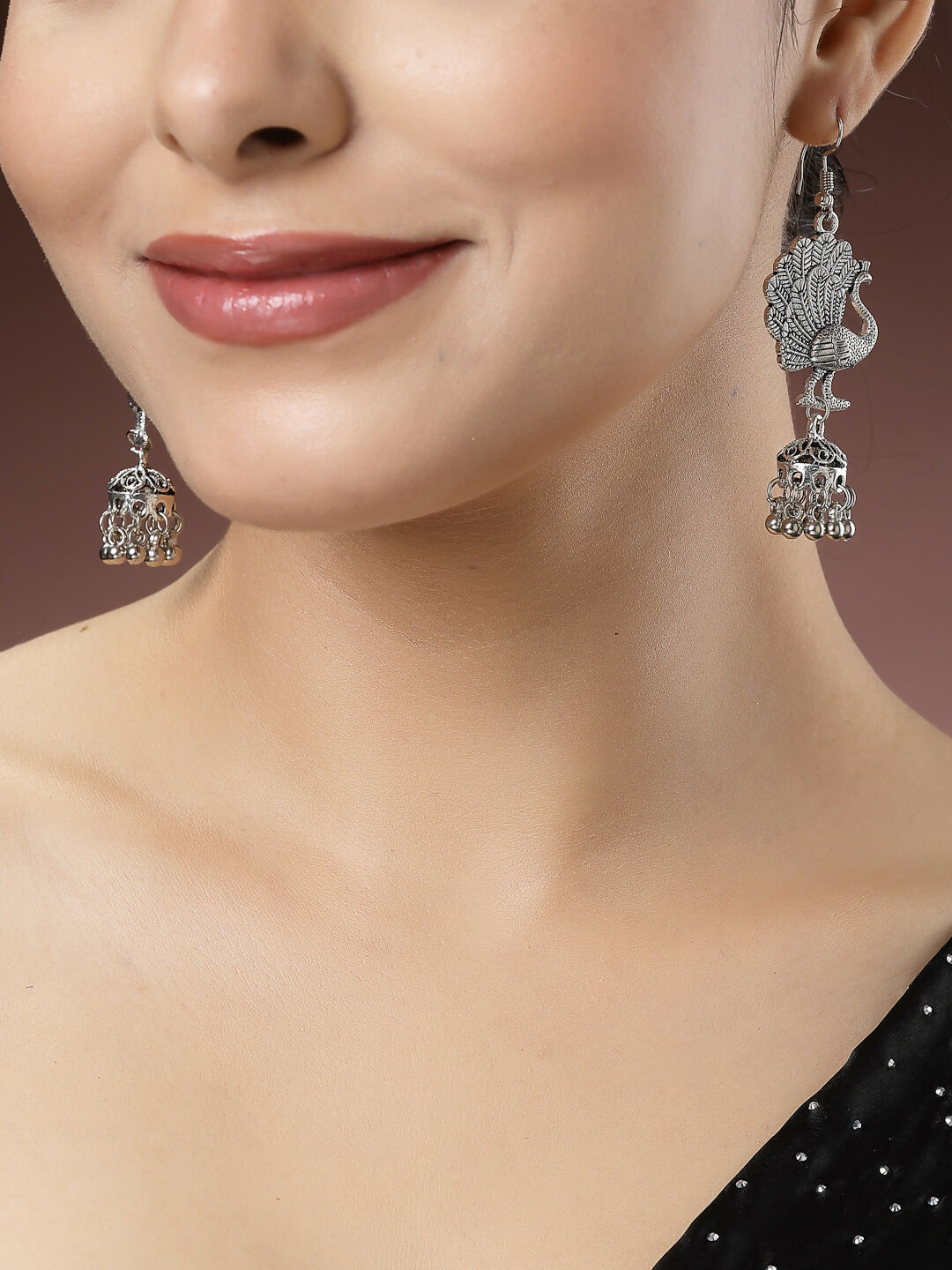 NVR Women's Silver-Toned Peacock Desing German Silver Oxidised Dome Shaped Jhumka Earrings | Swadesiicart