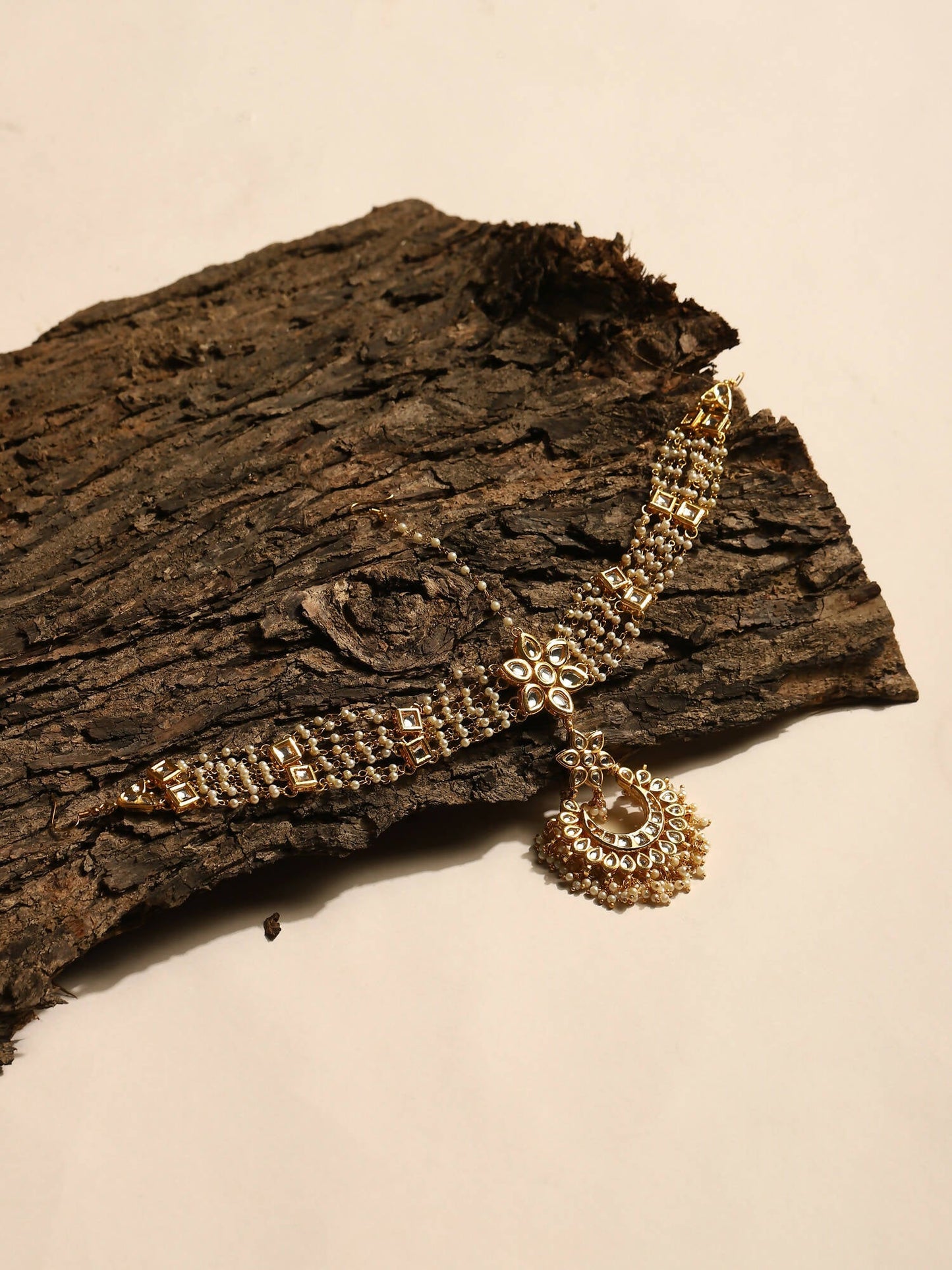 Gold-Polished White Kundan-Studded Pearl Beaded Matha Patti - Ruby Raang | Swadesiicart