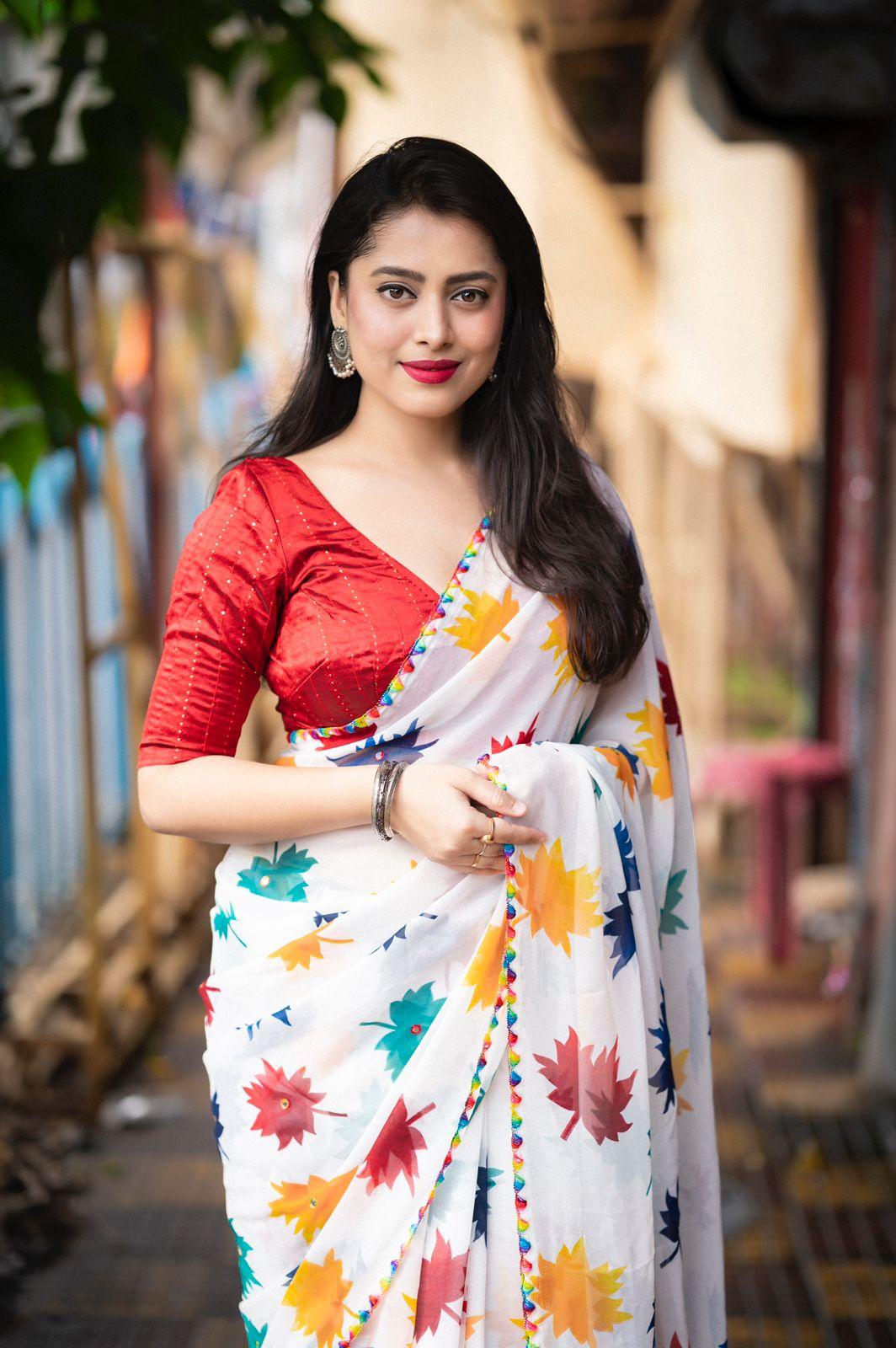 White Poly Georgette Ethnic Motifs Saree with Unstitched Blouse - Hiral Fashion | Swadesiicart