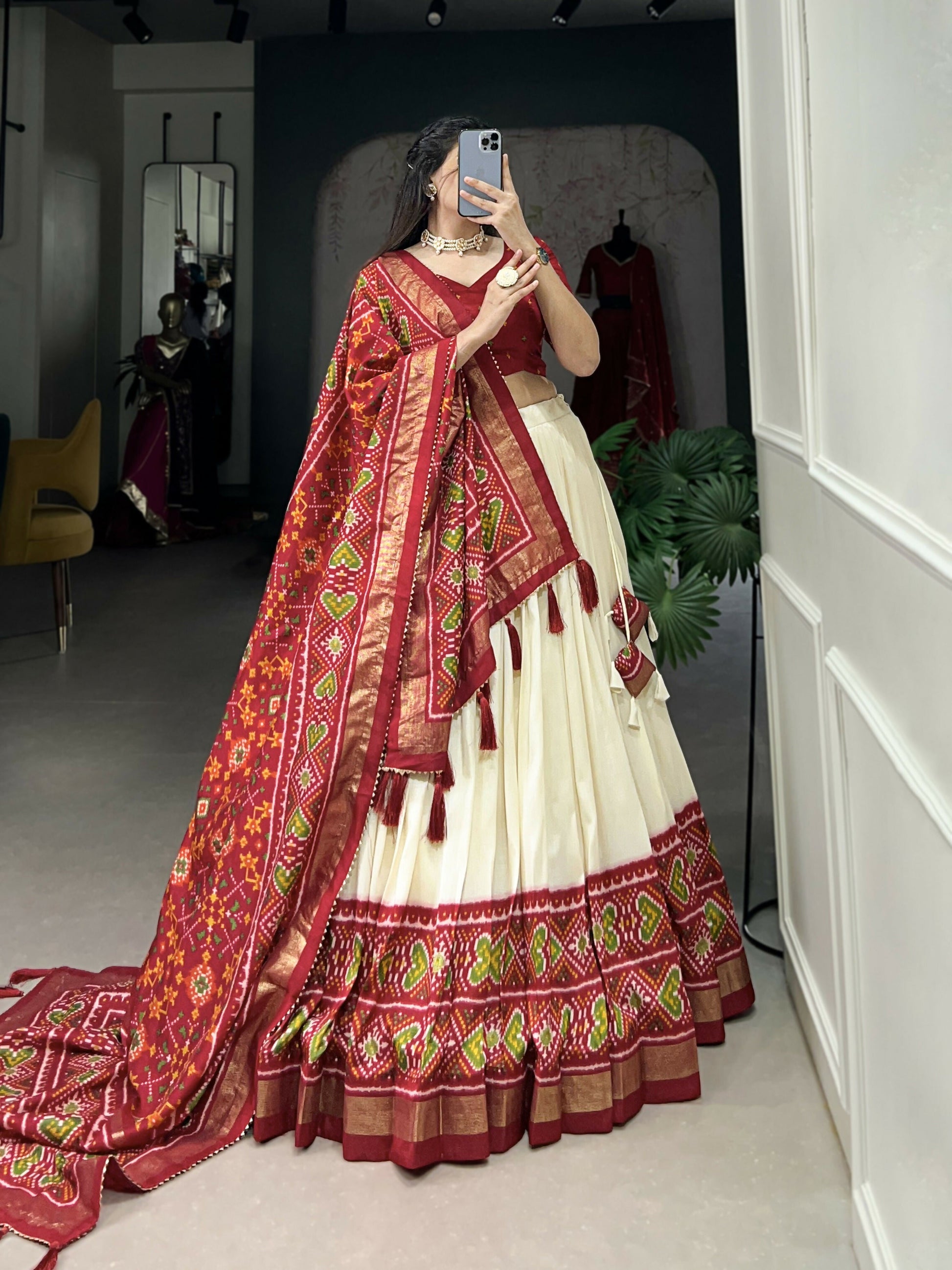 Lorenvalley Offwhite and Red Tussar Silk Patola Print Lehenga Choli | Swadesiicart