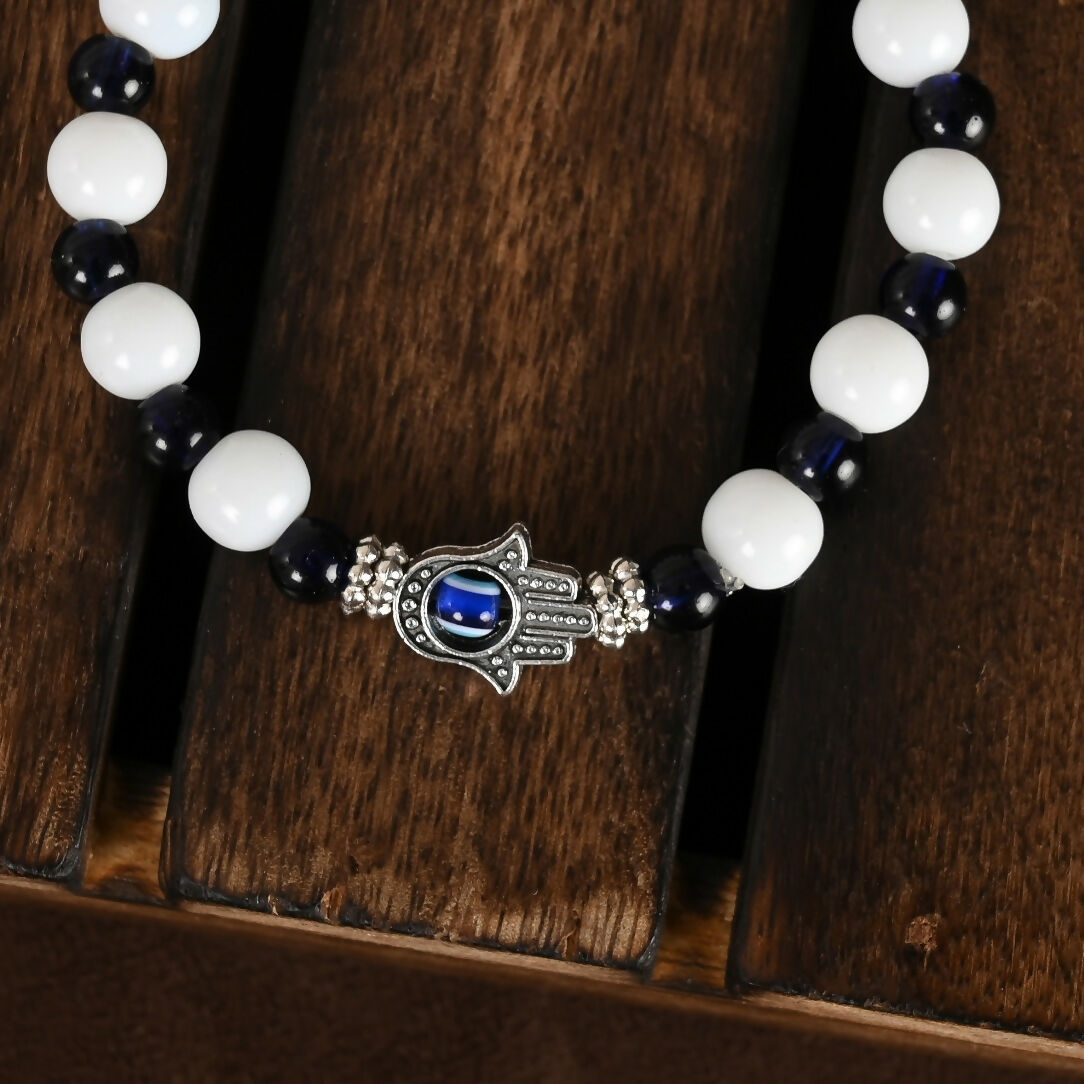 NVR Women & Men Black & White Evil Eye Elasticated Rakhi With Roli Chawal - Swadesiicart