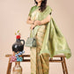 Astita Aura Silk Cream Light Green Banarasi Silk Saree | Swadesiicart