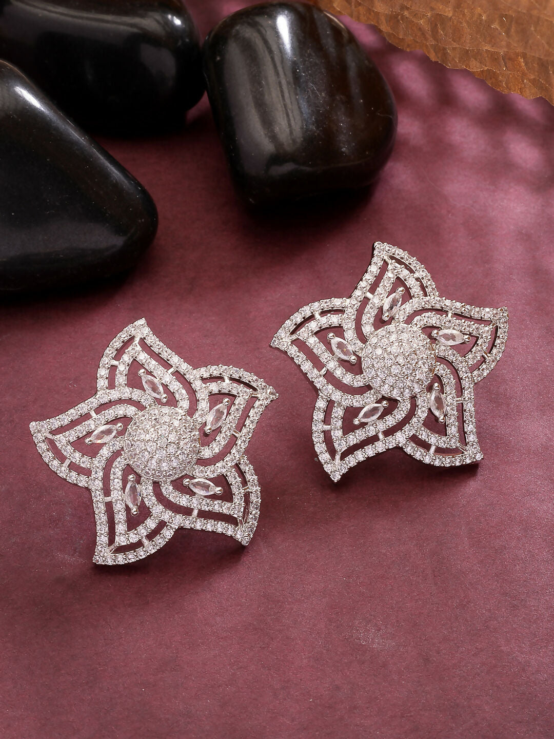 NVR Wome's Silver-Plated AD- Studded Star-Shaped Contemporary Stud Earrings | Swadesiicart