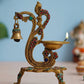 eCraftIndia Gold Toned Peacock Shaped Traditional Brass Diya With Bell & Stand | Swadesiicart