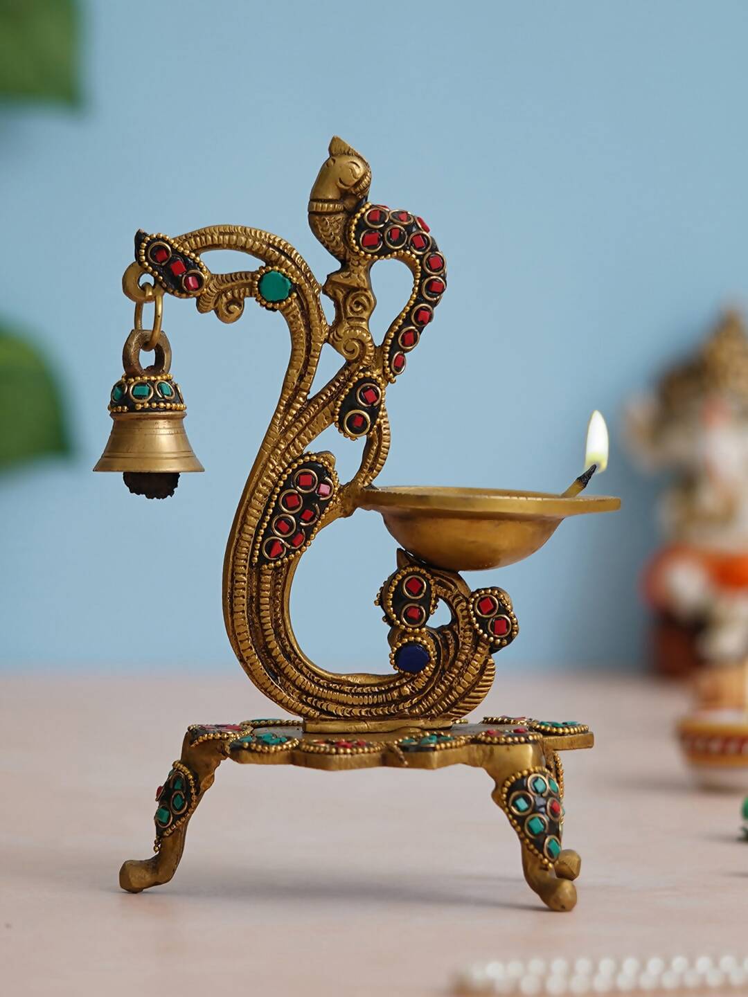 eCraftIndia Gold Toned Peacock Shaped Traditional Brass Diya With Bell & Stand | Swadesiicart