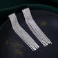 NVR Women Silver Toned Contemporary Ad Studded Drop Earrings | Swadesiicart