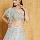 Jyoti Fashion Light Turquoise Thread, Zari and Paper Mirror Embroidered Organza One Shoulder Bridal Lehenga Choli | Swadesiicart