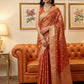 Anaita Orange Woven Tissue Silk Saree With Blouse