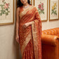 Anaita Orange Woven Tissue Silk Saree With Blouse