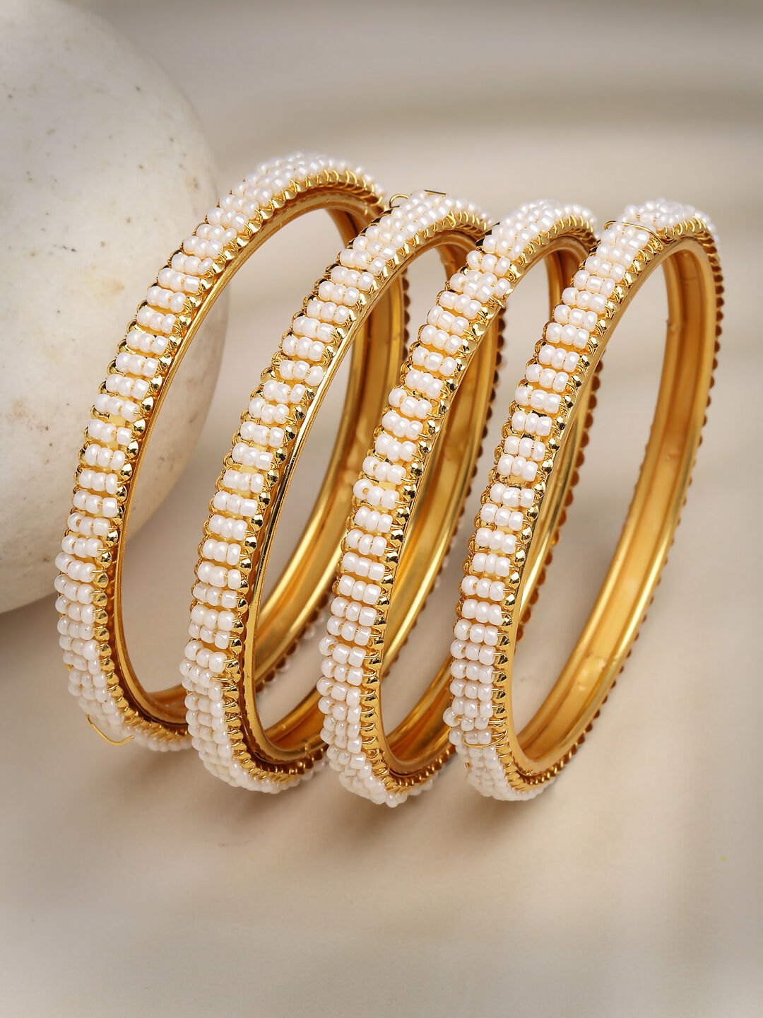 NVR Women's Set of 4 Gold-Polished Pearl Handcrafted Traditional Bangles - Swadesiicart