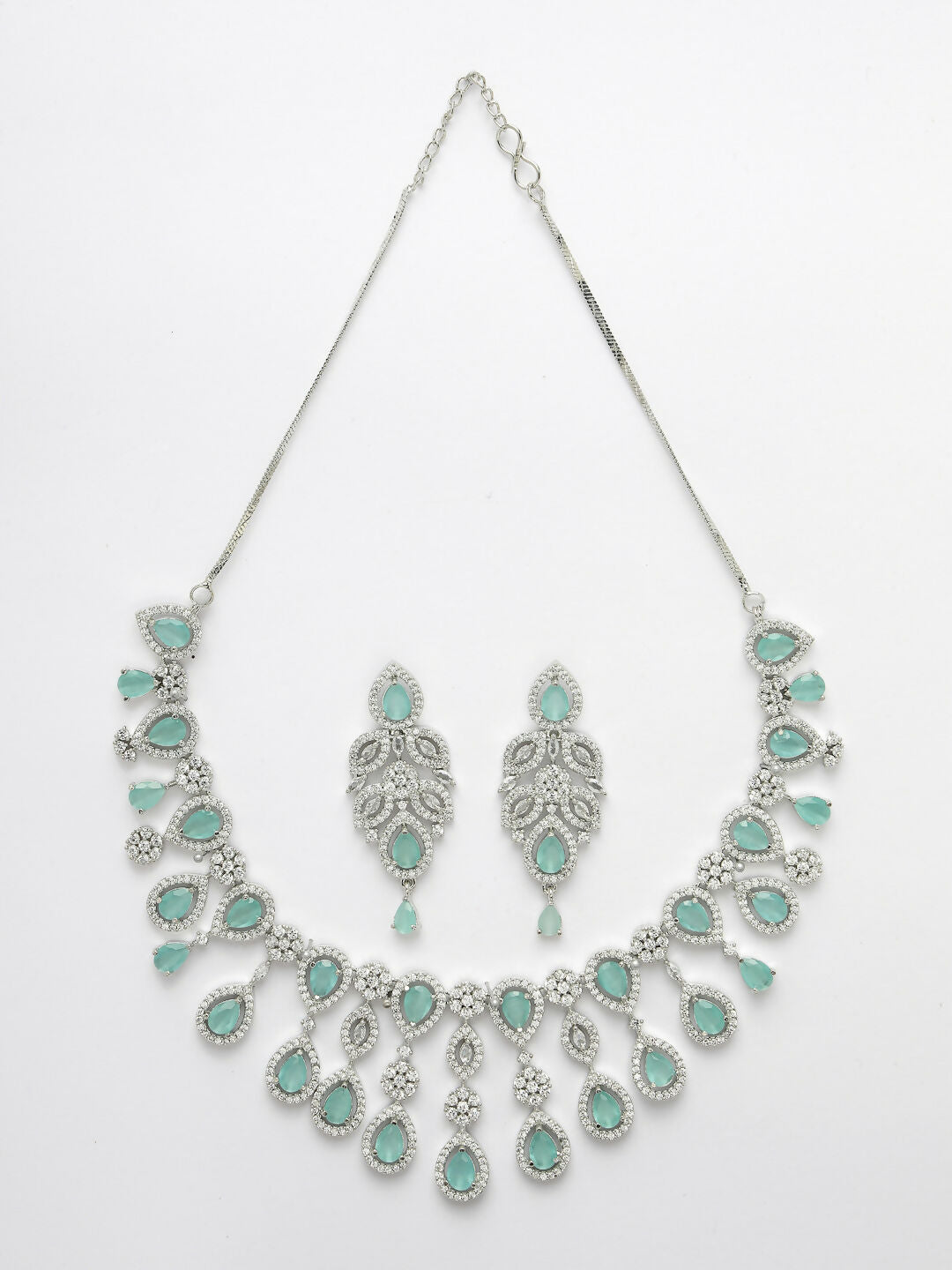 NVR Women's silver plated Turquoise CZ stone handcrafted jewellery set - Swadesiicart