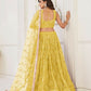 Aastha Fashion Yellow Butterfly Net Tone To Tone Thread Work, Sequence Work And Original Mirror Work Embroidery Wedding Wear Lehenga Choli