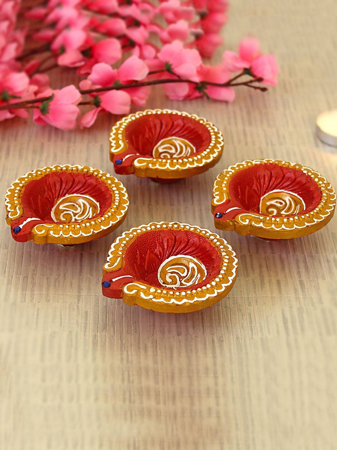 Tied Ribbons Set Of 4 Terracotta Diyas | Swadesiicart