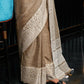 Shree Shyam Fashion Elegant Beige Woven Linen Saree with Contrast Zari Border & Tassels - Soft & Breathable Party Wear