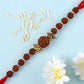 Rudraksha Divinity Rakhi & Kaju Katli Box | Swadesiicart