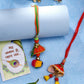 NVR Women Set of 2 Red Beaded Lumba Rakhi With Roli Chawal & Chocolate | Swadesiicart