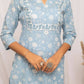 FIORRA Women's Floral Printed Sky Blue Cotton Straight Kurta - Swadesiicart