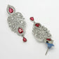 NVR Women's silver plated Maroon CZ stone handcrafted jewellery set - Swadesiicart