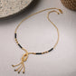 AanyaCentric Gold-Polished Short Mangalsutra Set with Earrings