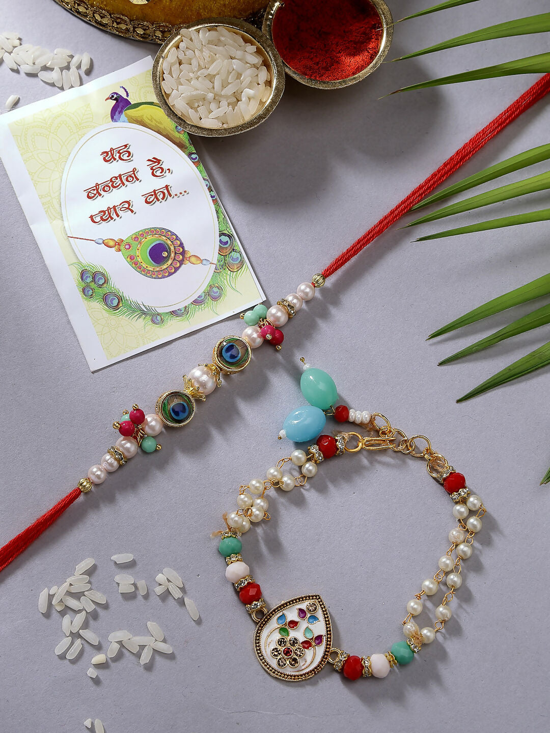 NVR Women & Men Set of 2 Multicolor Artificial Beads Bhaiya Bhabhi Rakhi With Roli Chawal & Chocolate | Swadesiicart