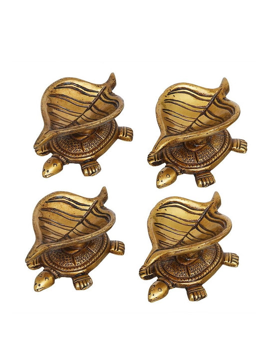 eCraftIndia 4 Pieces Beige Tortoise Statue Leaf Design Diyas | Swadesiicart